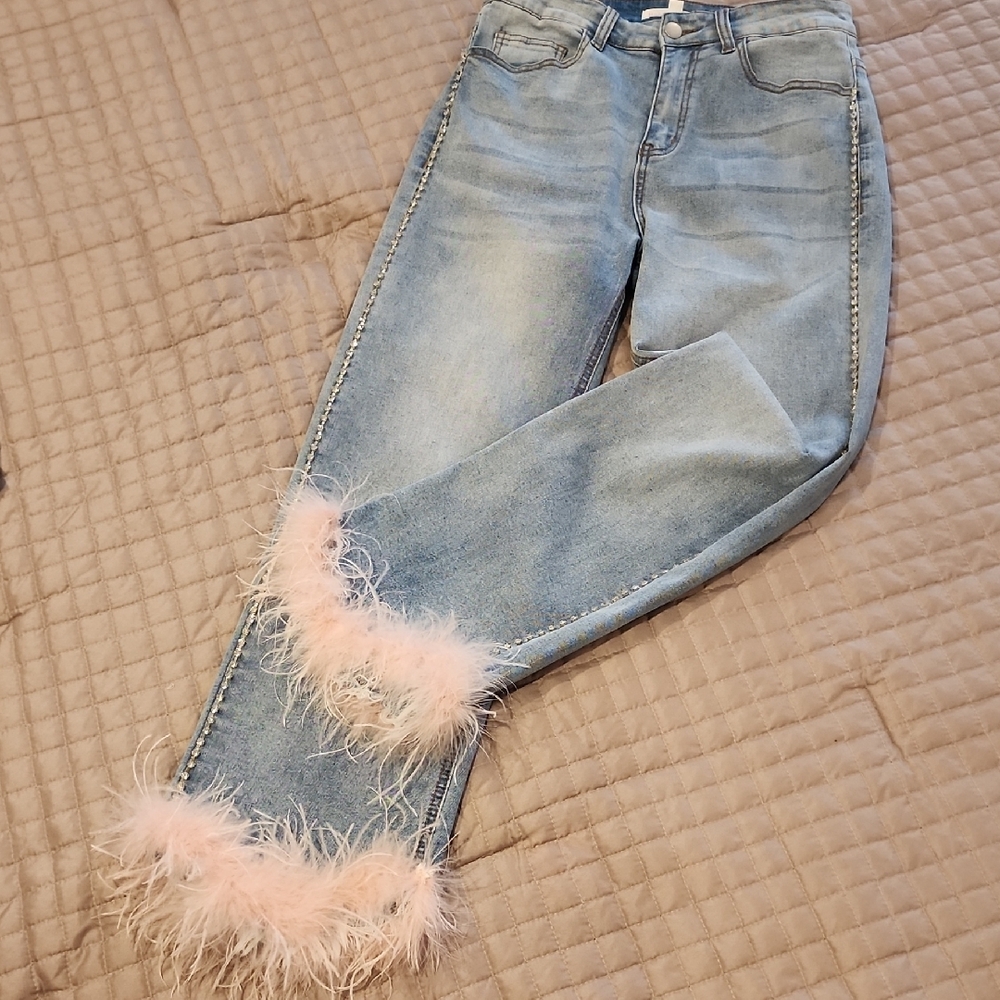 Stylish Blue Jeans with Pink Feather Trim